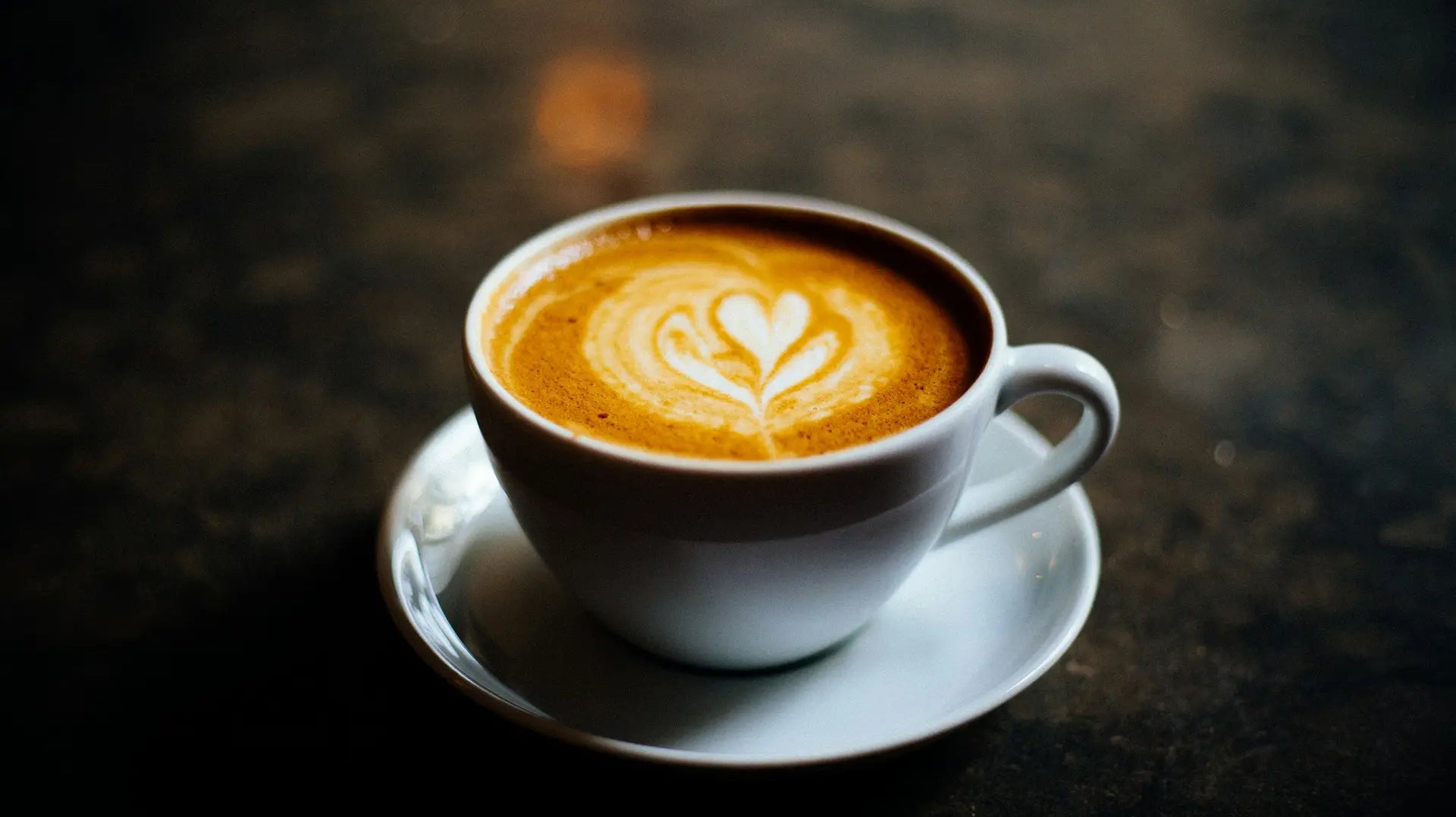 Cup of coffee with heart-shaped latte art, a nod to chicory as a coffee substitute — photo by Dani