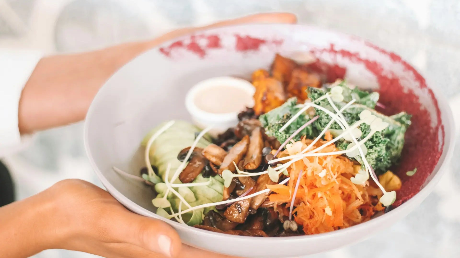 Bowl of fermented vegetables and wholesome food supporting gut health — photo by Maddi Bazzocco