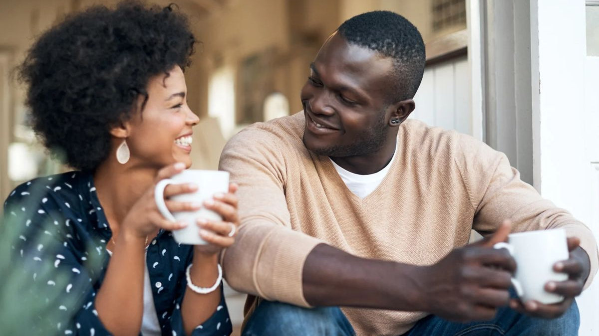 Happy couple drinking coffee