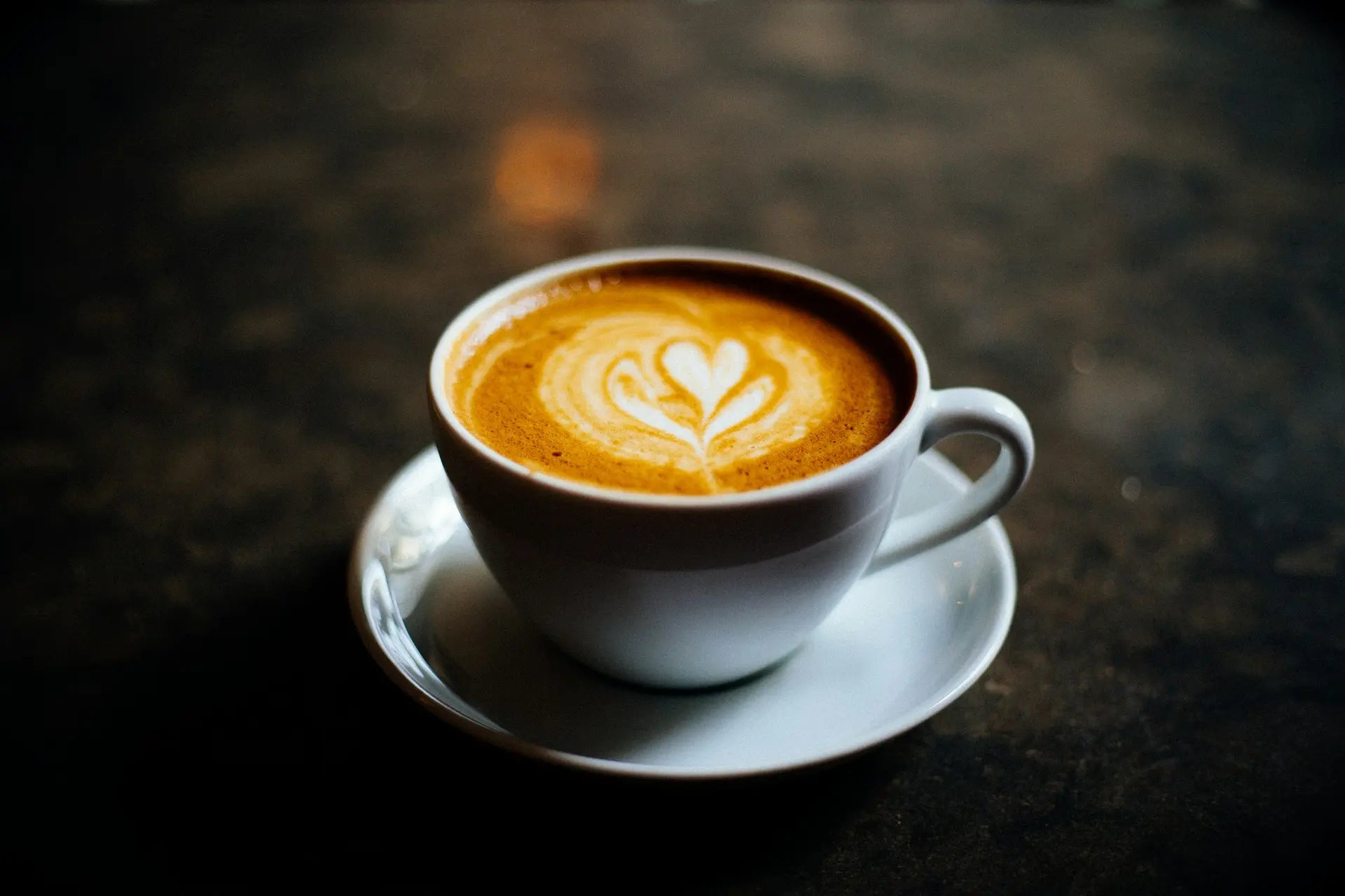 Cup of coffee with heart-shaped latte art, a nod to chicory as a coffee substitute — photo by Dani