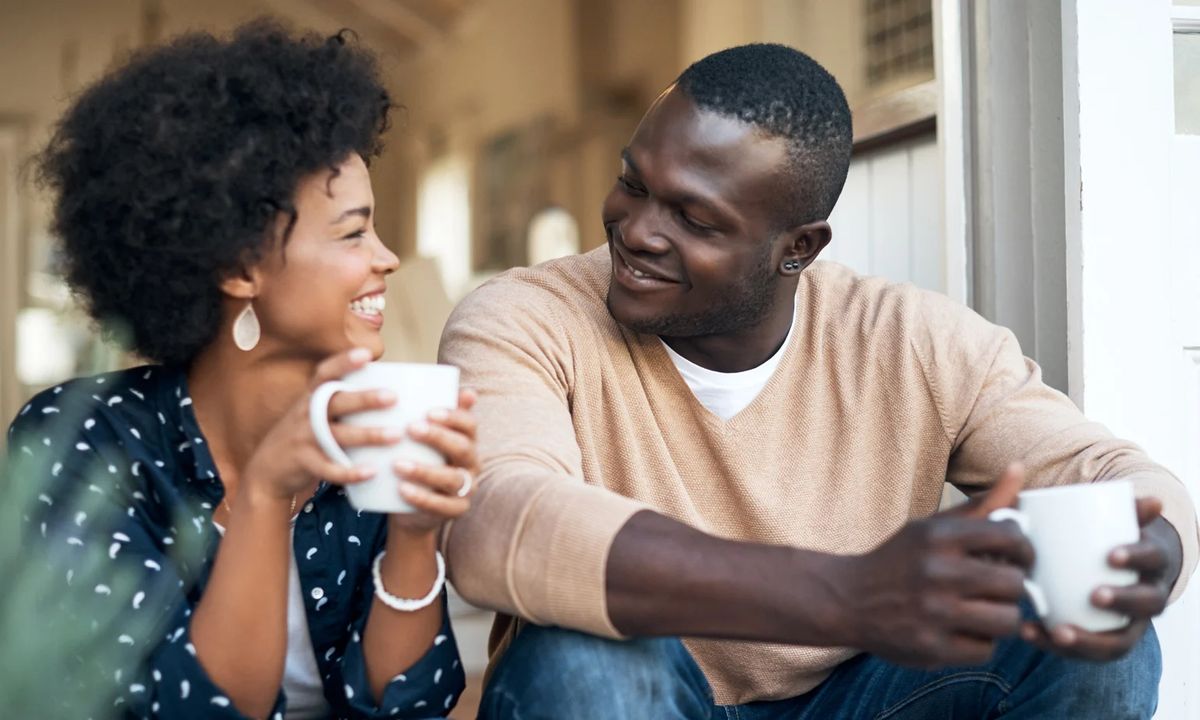 Happy couple drinking coffee